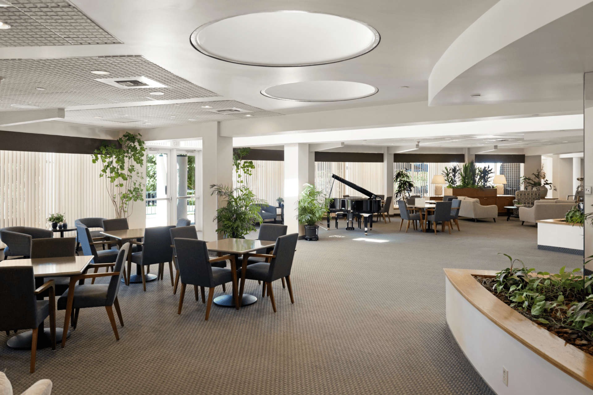 a large open space with a piano a large open space with a piano